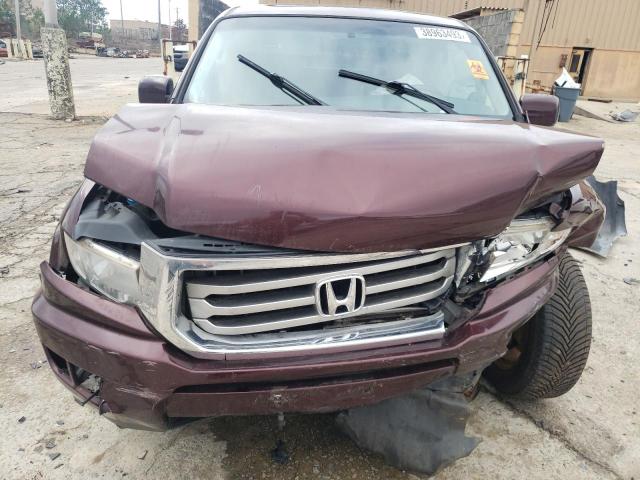 Photo 11 from auction – 2012 HONDA RIDGELINE with VIN 5FPYK1F58CB458324