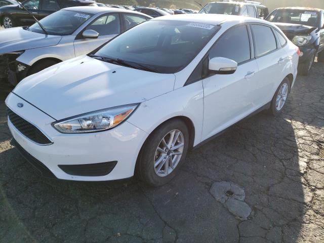 FORD FOCUS SE 2016 with VIN 1FADP3F29GL247703 - Photo from auction