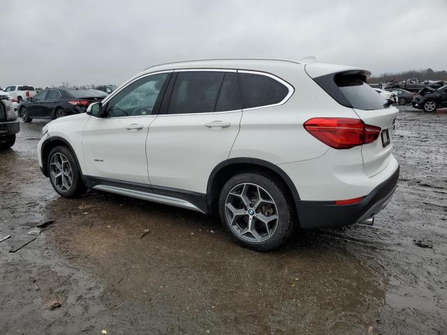 Photo 2 from auction – 2017 BMW X1 XDRIVE2 with VIN WBXHT3C35H5F72686