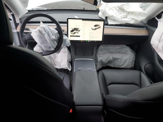 Photo 8 from auction – 2021 TESLA MODEL Y with VIN 5YJYGAEE3MF145582