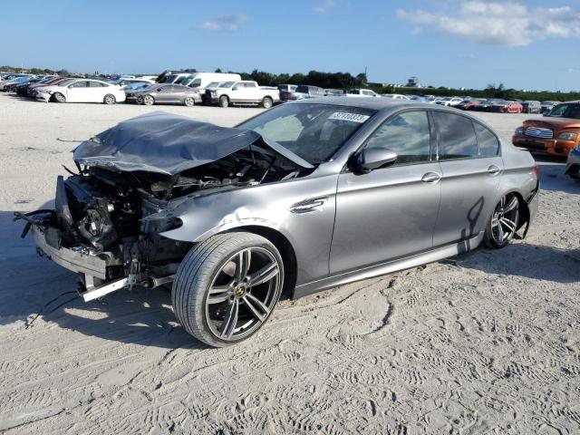 BMW M5 2014 with VIN WBSFV9C50ED097779 - Photo from auction
