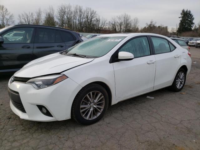 TOYOTA COROLLA L 2014 with VIN 5YFBURHE9EP034680 - Photo from auction