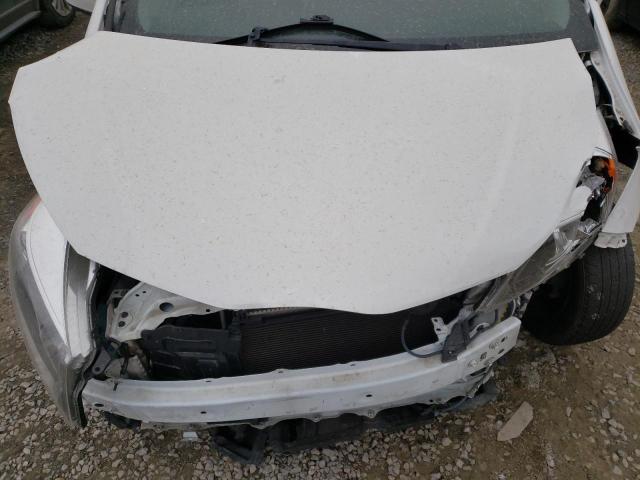 Photo 11 from auction – 2014 TOYOTA YARIS with VIN JTDKTUD38ED598723