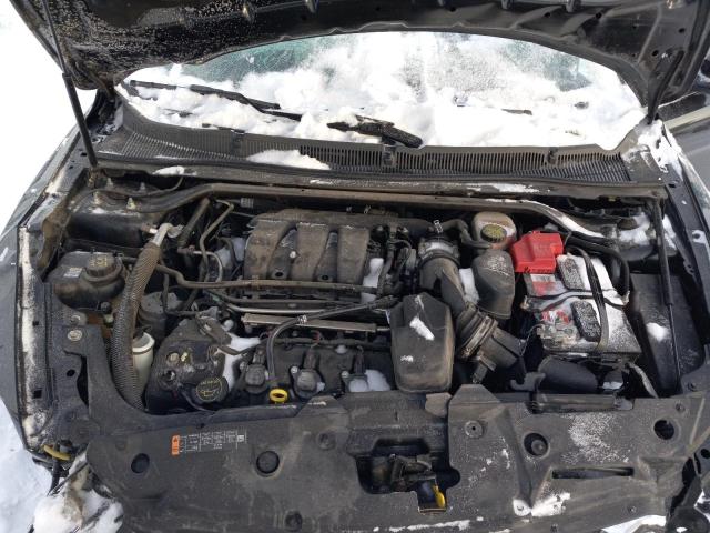 Photo 11 from auction – 2015 FORD TAURUS SEL with VIN 1FAHP2H85FG166041