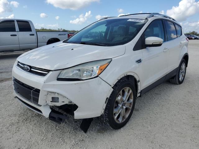 FORD ESCAPE TIT 2014 with VIN 1FMCU0J96EUB55758 - Photo from auction