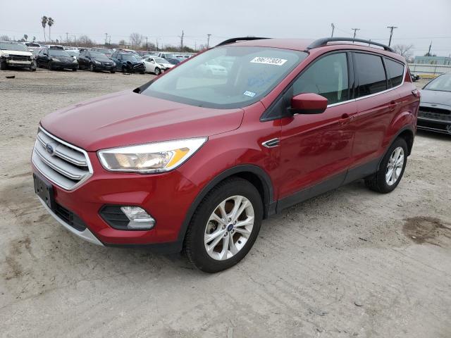 FORD ESCAPE SE 2018 with VIN 1FMCU0G99JUC38702 - Photo from auction