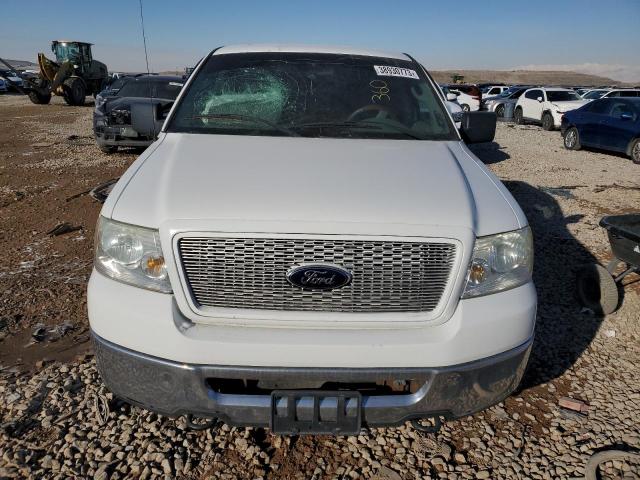 Foto 5 de la subasta – 2006 FORD F150 con VIN 1FTRX14W66KD49331