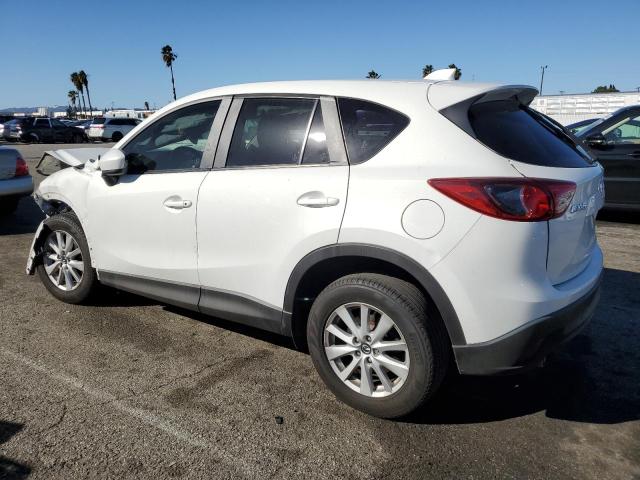 Photo 2 from auction – 2014 MAZDA CX-5 TOURI with VIN JM3KE2CY9E0331231