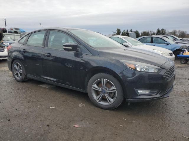 Photo 4 from auction – 2016 FORD FOCUS SE with VIN 1FADP3FE3GL298463