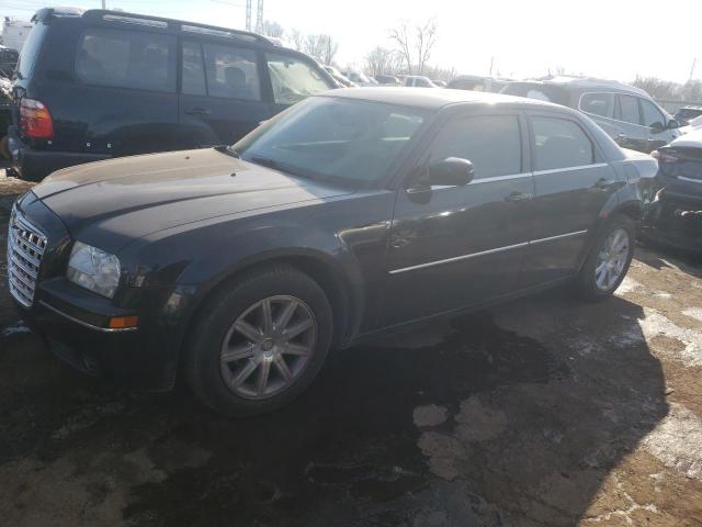 CHRYSLER 300 TOURIN 2009 with VIN 2C3LA53V99H577797 - Photo from auction