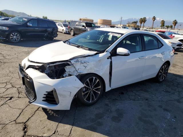 TOYOTA COROLLA L 2018 with VIN 5YFBURHE6JP835089 - Photo from auction