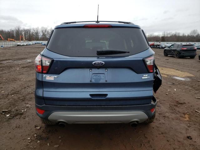 Photo 6 from auction – 2018 FORD ESCAPE SE with VIN 1FMCU9GD8JUB92353