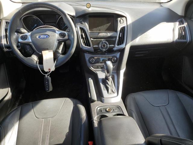 Photo 8 from auction – 2014 FORD FOCUS TITA with VIN 1FADP3J29EL357946
