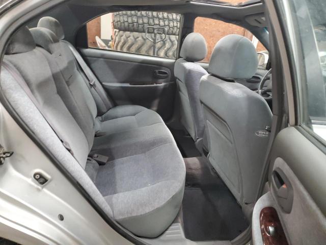 Photo 10 from auction – 2003 KIA OPTIMA LX with VIN KNAGD128335213671