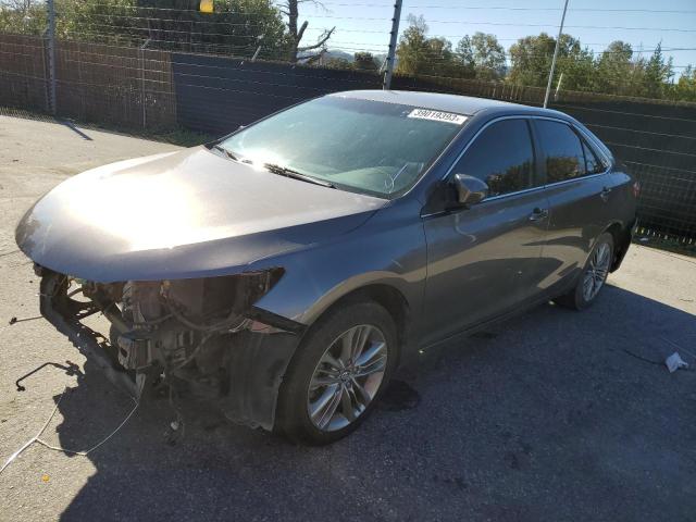 TOYOTA CAMRY LE 2016 with VIN 4T1BF1FK0GU234661 - Photo from auction