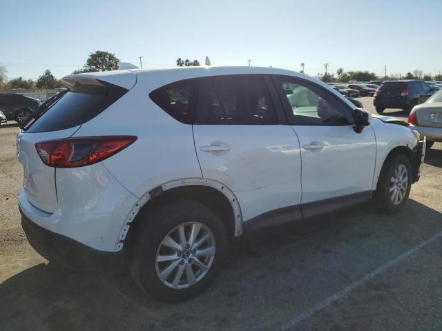 Photo 3 from auction – 2014 MAZDA CX-5 TOURI with VIN JM3KE2CY9E0331231