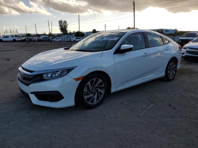 HONDA CIVIC EX 2018 with VIN 19XFC2F8XJE024860 - Photo from auction