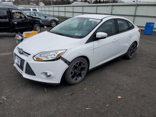 FORD FOCUS SE 2014 with VIN 1FADP3F28EL319715 - Photo from auction