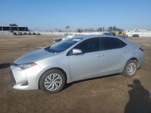 TOYOTA COROLLA L 2018 with VIN 2T1BURHE1JC003465 - Photo from auction