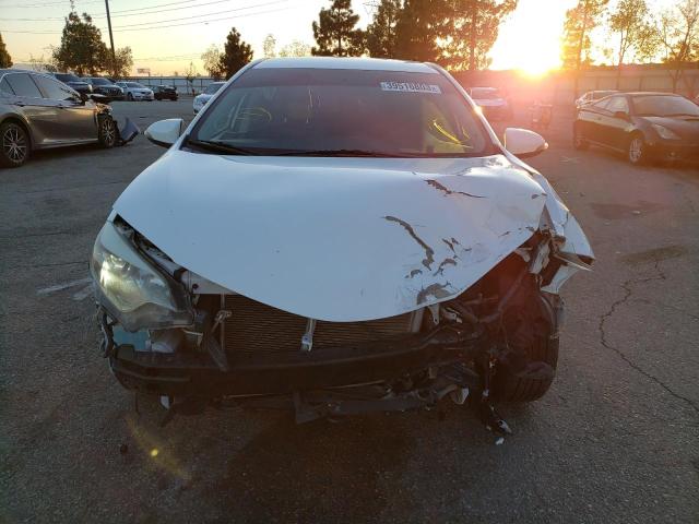 Photo 5 from auction – 2014 TOYOTA COROLLA L with VIN 5YFBURHE2EP099158