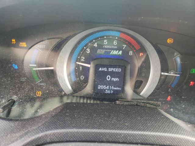 Photo 9 from auction – 2010 HONDA INSIGHT EX with VIN JHMZE2H70AS029752