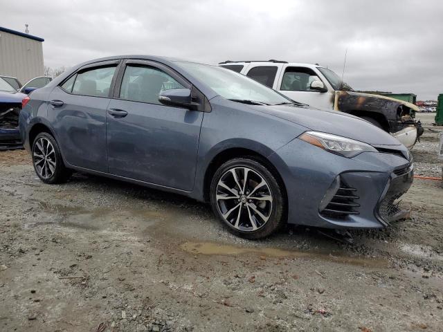 Photo 4 from auction – 2017 TOYOTA COROLLA L with VIN 5YFBURHEXHP711952
