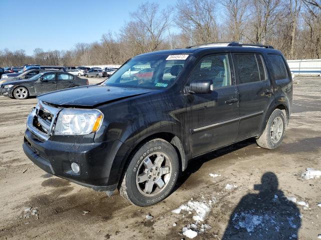 HONDA PILOT TOUR 2011 with VIN 5FNYF4H95BB102393 - Photo from auction