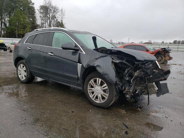 Photo 4 from auction – 2014 CADILLAC SRX LUXURY with VIN 3GYFNEE39ES582539
