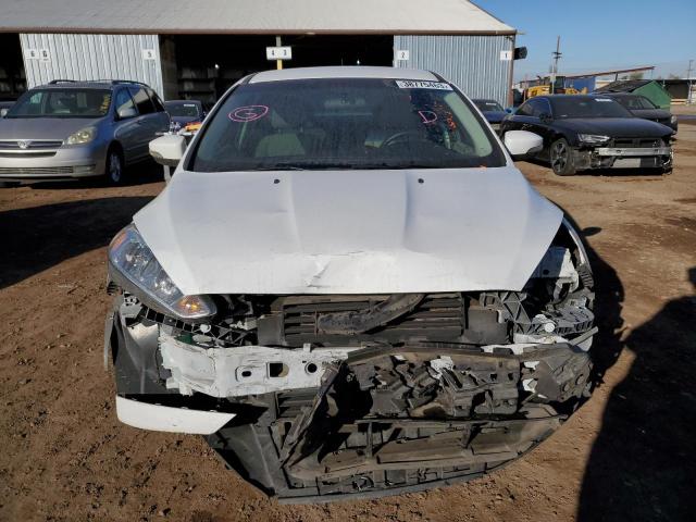 Photo 5 from auction – 2015 FORD FOCUS SE with VIN 1FADP3F20FL221487