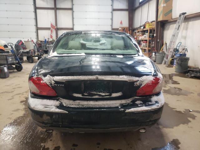 Photo 6 from auction – 2002 JAGUAR X-TYPE 2.5 with VIN SAJGB51D92XC75047