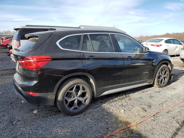 Photo 3 from auction – 2016 BMW X1 XDRIVE2 with VIN WBXHT3Z31G4A51962