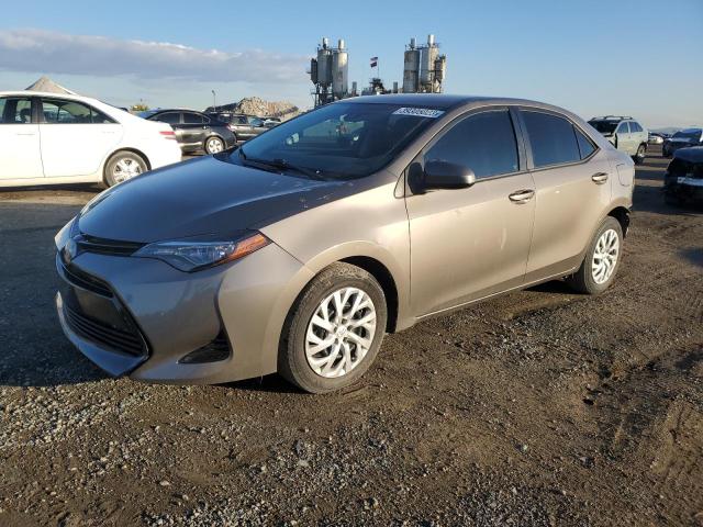TOYOTA COROLLA L 2018 with VIN 5YFBURHE3JP748282 - Photo from auction