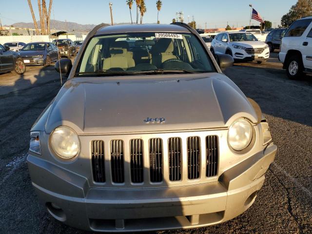 Photo 5 from auction – 2010 JEEP COMPASS SP with VIN 1J4NT4FB1AD516174
