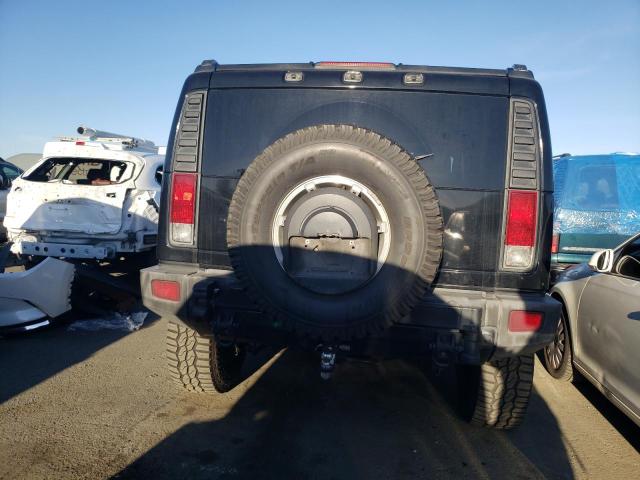 Photo 6 from auction – 2006 HUMMER H2 with VIN 5GRGN23U36H109345