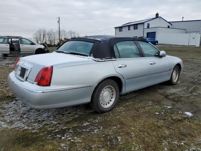Photo 3 from auction – 2000 LINCOLN TOWN CAR E with VIN 1LNHM81W7YY903280