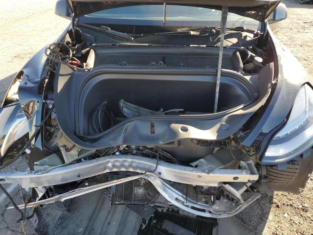 Photo 11 from auction – 2022 TESLA MODEL Y with VIN 7SAYGDEEXNF494406