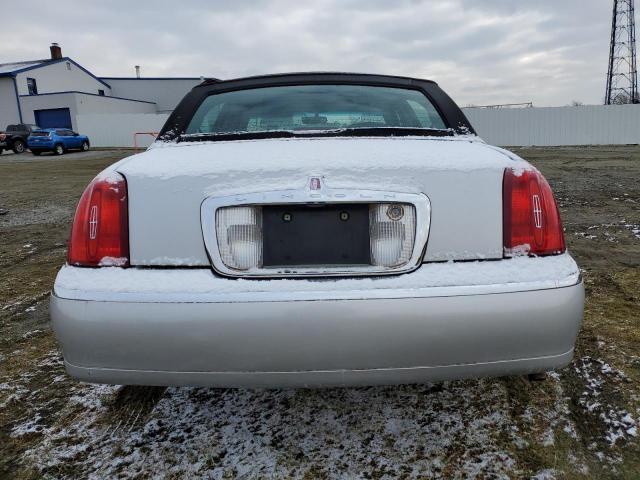Photo 6 from auction – 2000 LINCOLN TOWN CAR E with VIN 1LNHM81W7YY903280