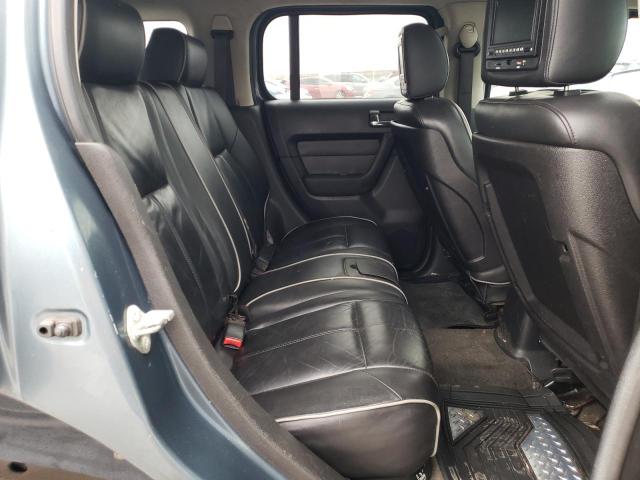 Photo 11 from auction – 2006 HUMMER H3 with VIN 5GTDN136268193814