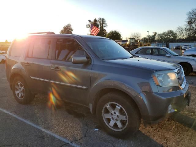 Photo 4 from auction – 2010 HONDA PILOT TOUR with VIN 5FNYF3H97AB003602