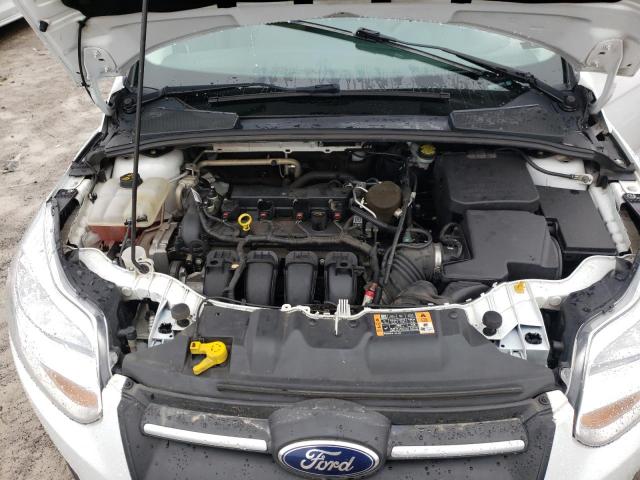 Photo 11 from auction – 2014 FORD FOCUS SE with VIN 1FADP3F21EL450274