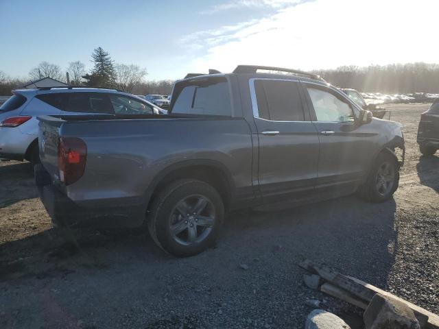 Photo 3 from auction – 2022 HONDA RIDGELINE with VIN 5FPYK3F74NB001834