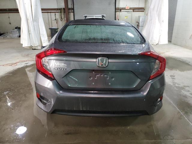 Photo 6 from auction – 2018 HONDA CIVIC LX with VIN 19XFC2F51JE203987