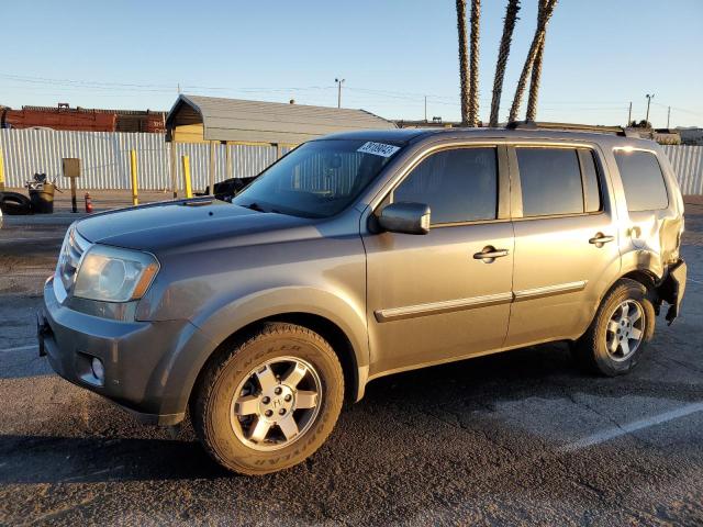 HONDA PILOT TOUR 2010 with VIN 5FNYF3H97AB003602 - Photo from auction