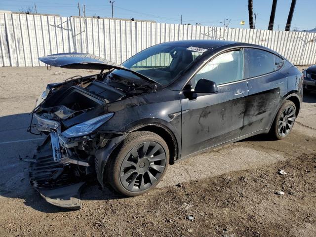 TESLA MODEL Y 2022 with VIN 7SAYGDEEXNF494406 - Photo from auction