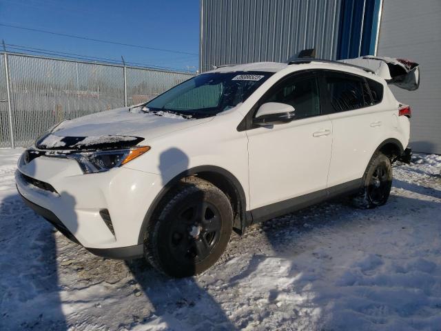 TOYOTA RAV4 LE 2018 with VIN 2T3BFREV1JW776571 - Photo from auction