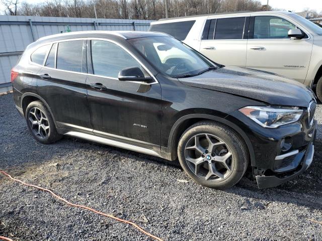 Photo 4 from auction – 2016 BMW X1 XDRIVE2 with VIN WBXHT3Z31G4A51962