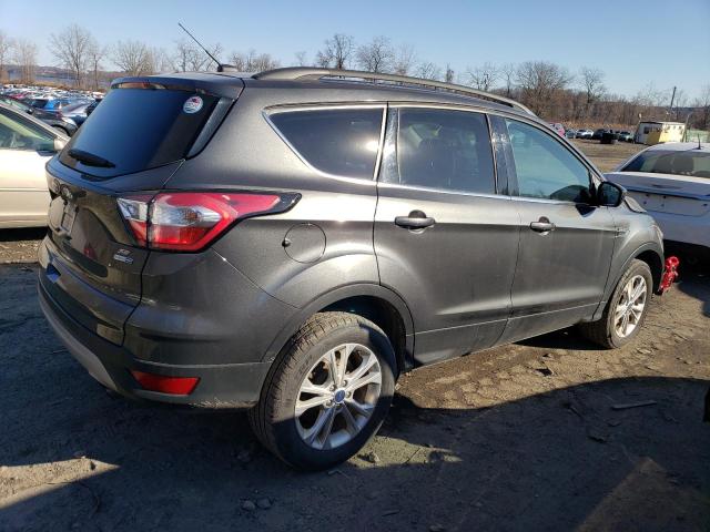 Photo 3 from auction – 2017 FORD ESCAPE SE with VIN 1FMCU9GD3HUA87259