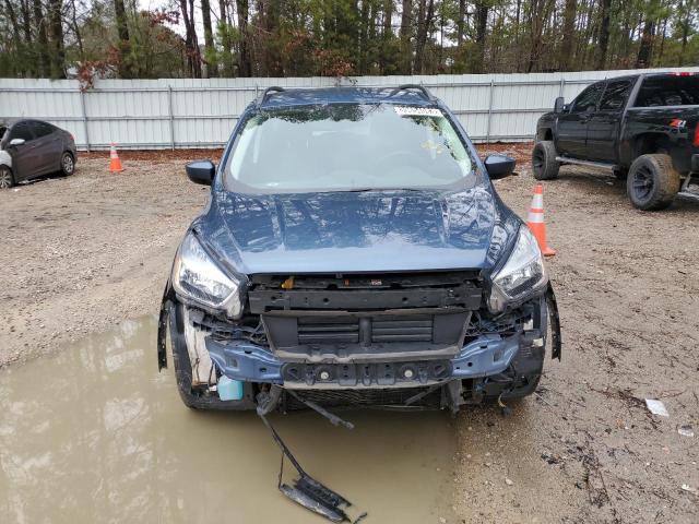 Photo 5 from auction – 2018 FORD ESCAPE SE with VIN 1FMCU9GD5JUC58860