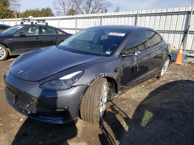 TESLA MODEL 3 2022 with VIN 5YJ3E1EBXNF328694 - Photo from auction