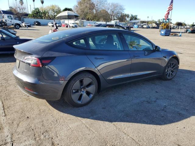 Photo 3 from auction – 2022 TESLA MODEL 3 with VIN 5YJ3E1EB1NF189104